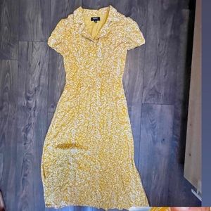 Audrey mustard yellow dress.